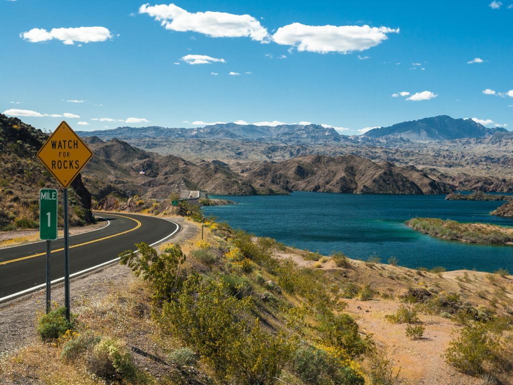 Road running alongside Lake Mohave in Arizona