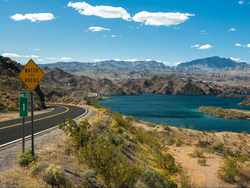 Road running alongside Lake Mohave in Arizona