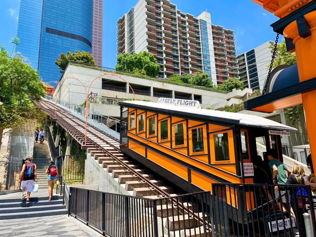 Angels Flight Railway, LA, with skyscrapers and blue sky in the background