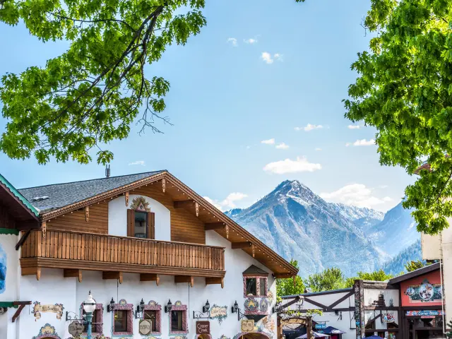Bavarian-style building with mountain peak in the background
