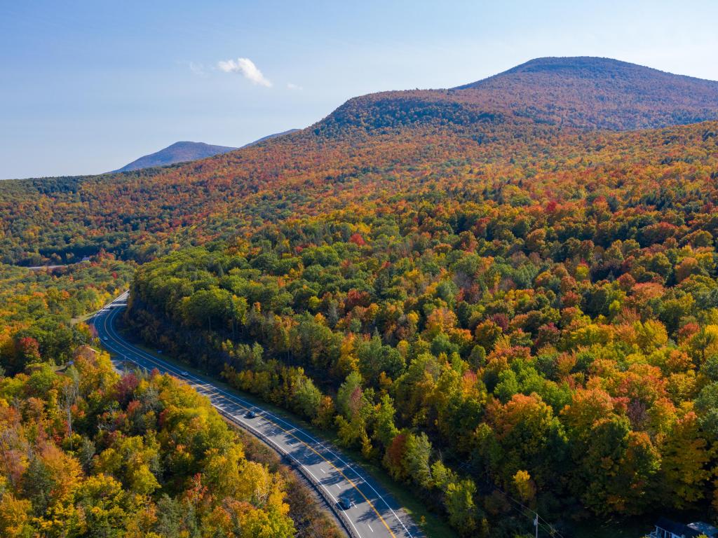 Aerial view of fall foliage along the Catskill Mountains in upstate New York along Five State Lookout.