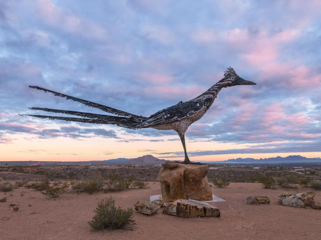 Recycled Roadrunner Sculpture at a rest stop off Interstate 10 just west of Las Cruces, New Mexico at the sunset.
