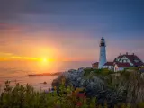 Portland, Maine, USA with a view of the Portland Head Light Sunrise in Maine.
