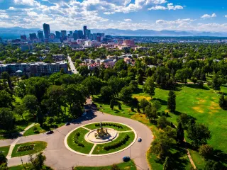 City park green spaces circle pattern monument aerial drone view high above Denver , Colorado