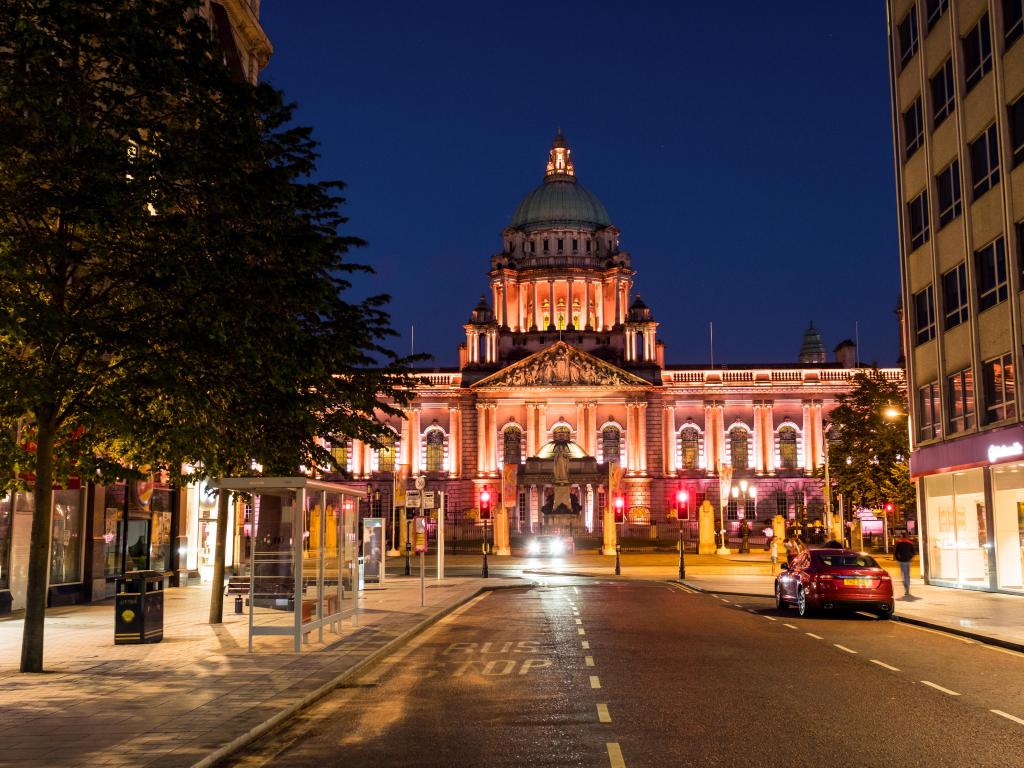 Belfast, UK. Nightlife with city hall in Belfast, UK the capital of Northern Ireland at night with dark blue sky