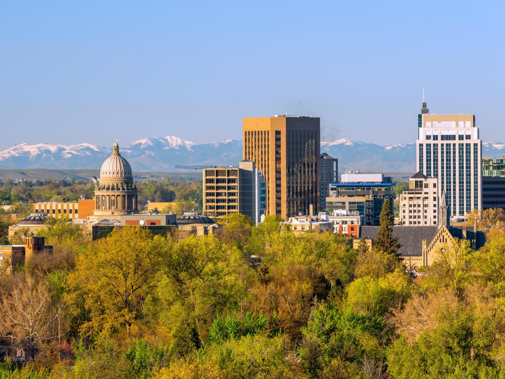 Autumn trees surround the city skyline of  Boise, Idaho, USA.