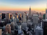 Amazing panorama view of New York city skyline and skyscraper at sunset. 