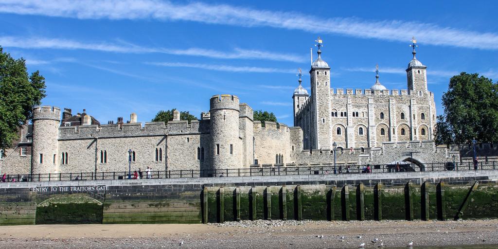 The Tower of London across the Thames at low tide 