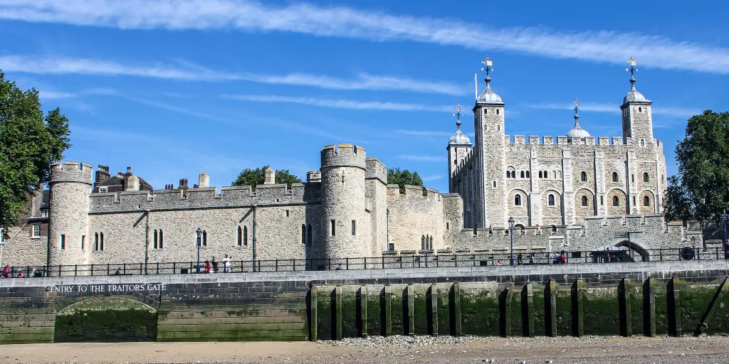 The Tower of London across the Thames at low tide 