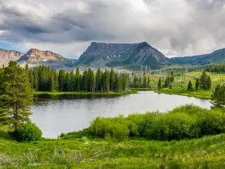 Beautiful view across Trappers Lake, surrounding by lush forests and mountains