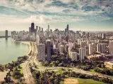 Chicago Skyline aerial view with road by the beach, vintage colors.