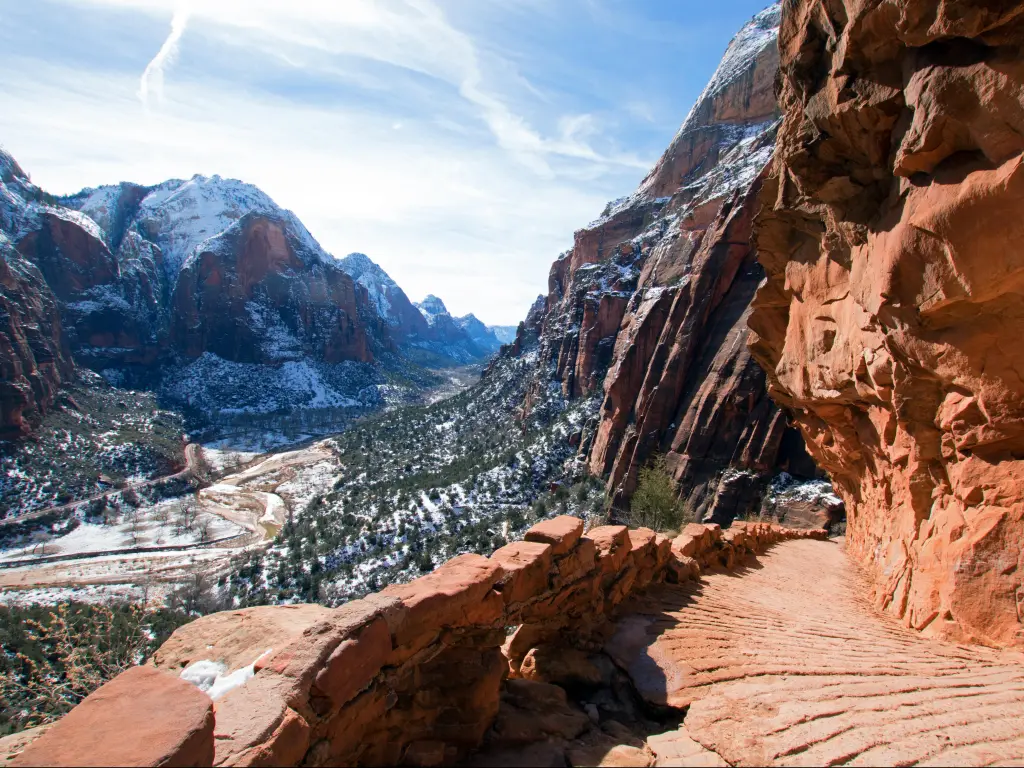 Snow on the mountain at Angels Landing, Zion National Park, in winter. Red rocks in the foreground