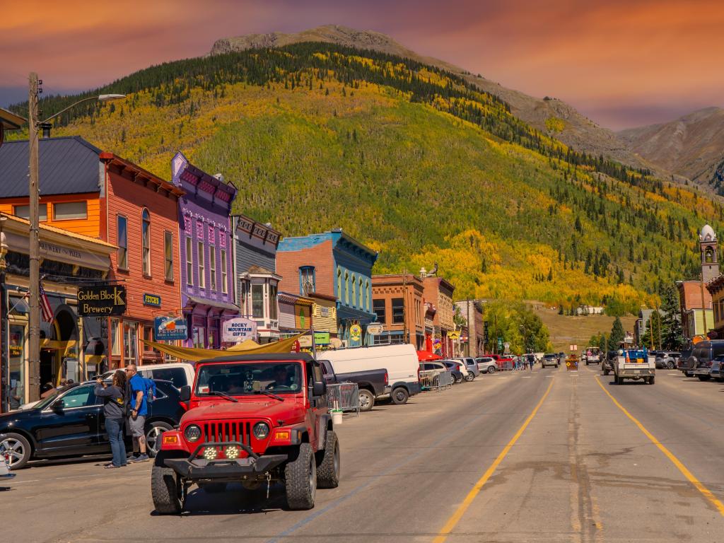 The main street of Silverton Colorado, with vehicles parked either side