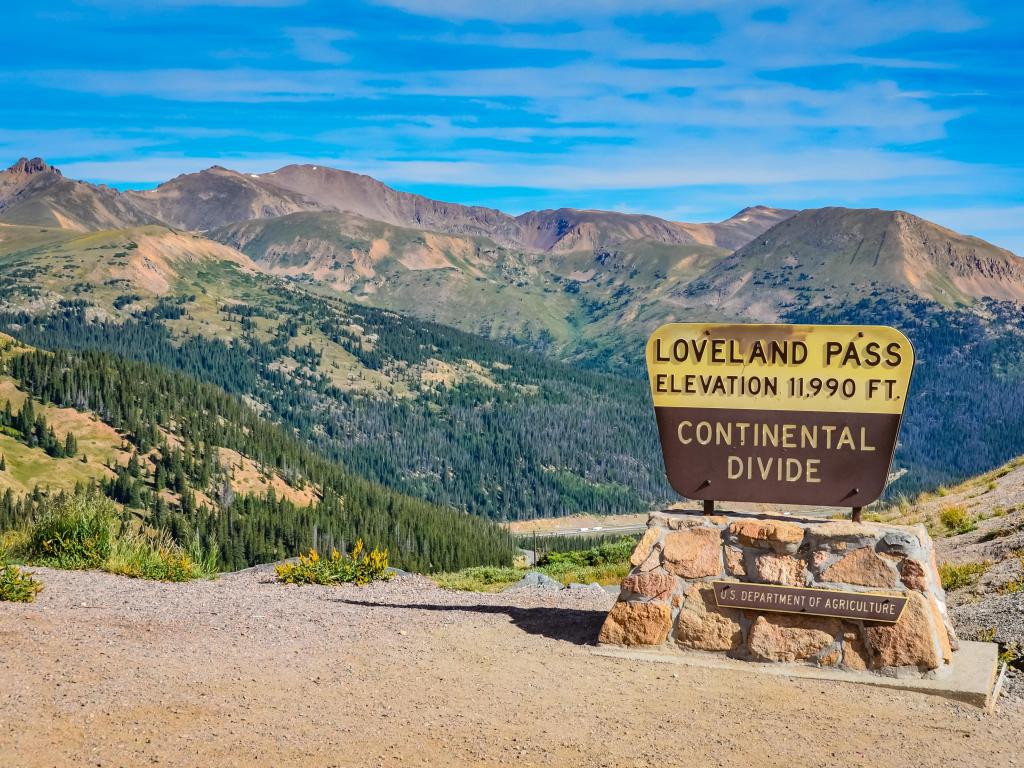 Loveland Pass in Colorado, with the mountains in the background at an elevation of 11,990 feet on a sunny day