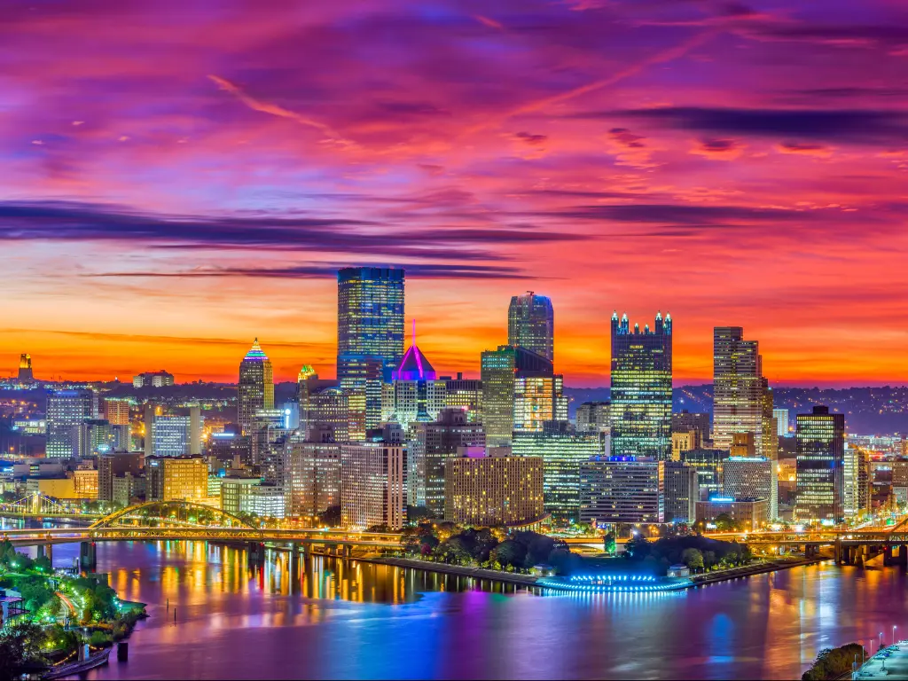 Pittsburgh, Pennsylvania, USA downtown skyline on the rivers at dawn.