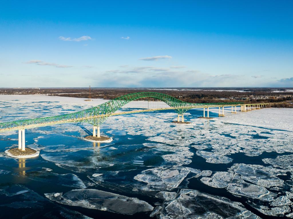 Laviolette Bridge, spanning the St Lawrence River near Trois-Rivieres during winter, with ice on the river