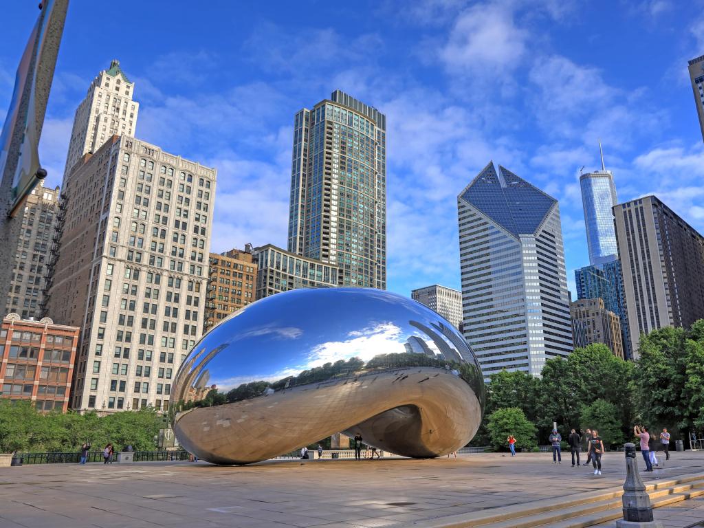 Chicago, Illinois, USA with The 'Cloud Gate' also known as 'The Bean' in Millennium Park in Downtown Chicago.