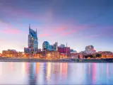 Nashville, Tennessee, USA with the downtown skyline with Cumberland River in USA at sunset.