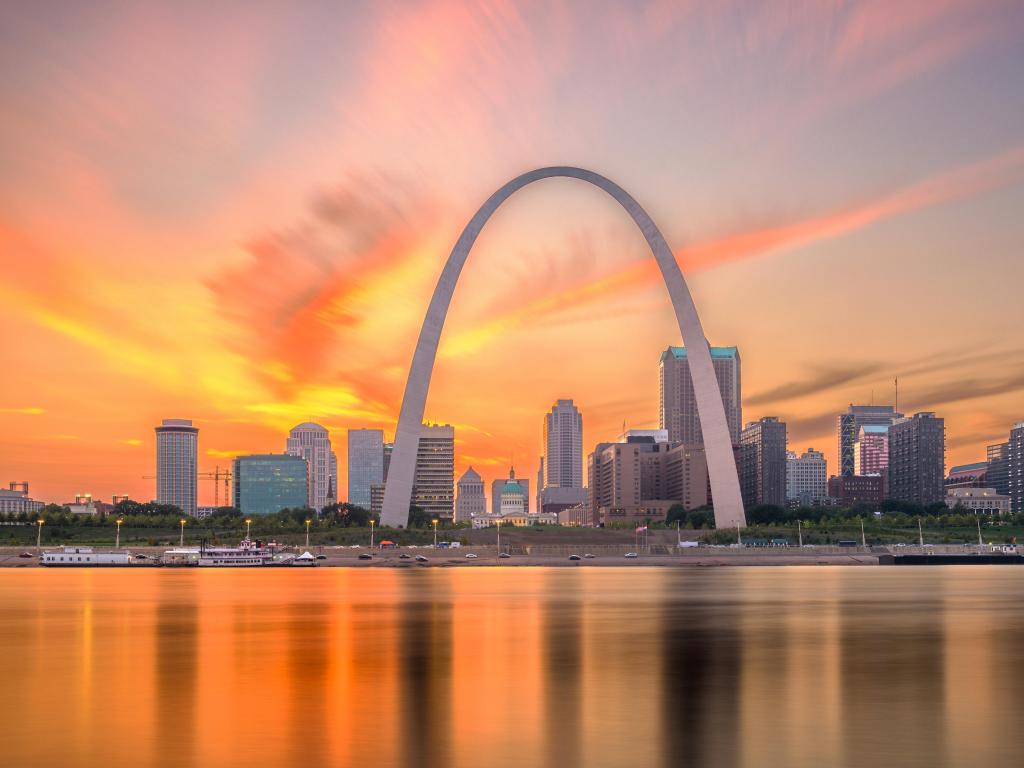 St. Louis, Missouri, USA downtown cityscape on the river at dusk.