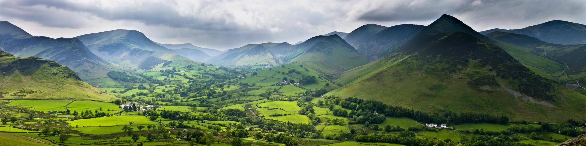 Lake District, England with a panoramic image of the Newlands valley from the sumit of Cat Bells in the English Lake District.