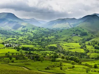 Lake District, England with a panoramic image of the Newlands valley from the sumit of Cat Bells in the English Lake District.