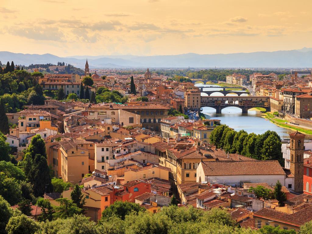 Florence, Italy with a beautiful cityscape skyline of Firenze (Florence), Italy, with the bridges over the river Arno.