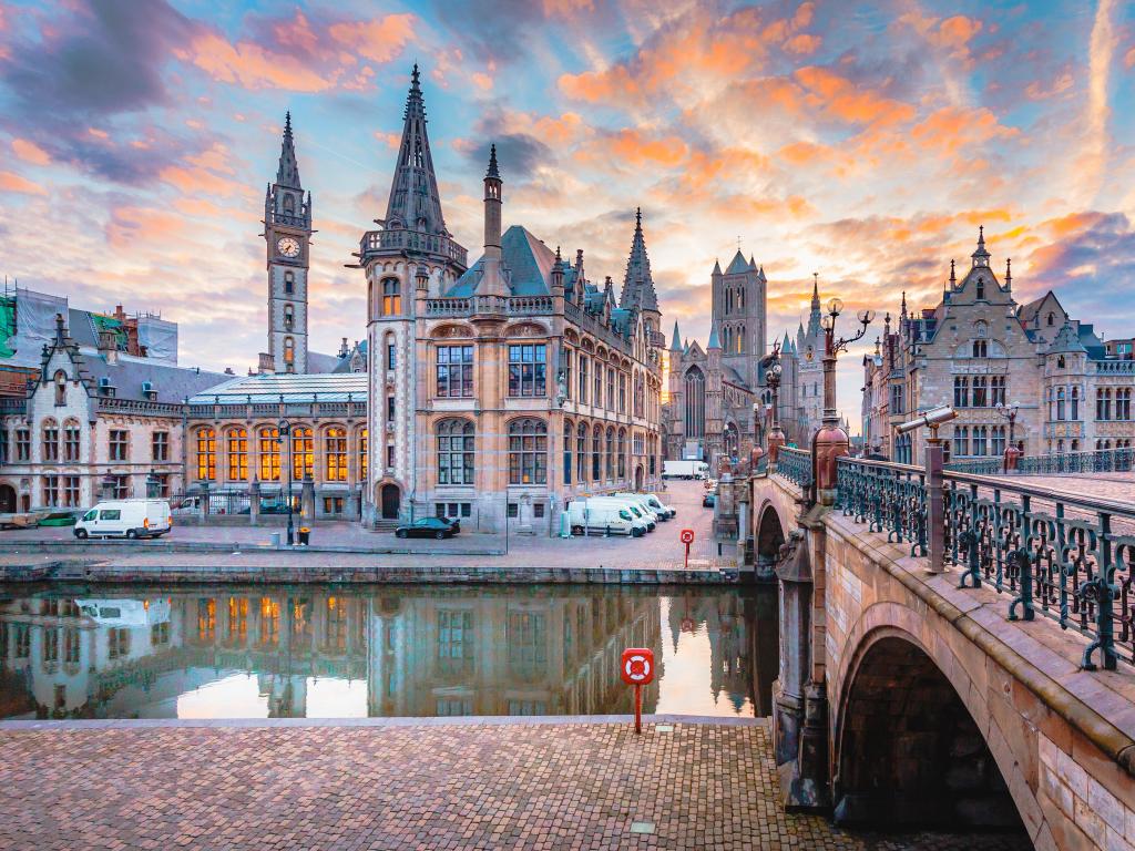 Panoramic view of the historic city center of Ghent with Leie river illuminated in beautiful twilight, Ghent, East Flanders, Belgium