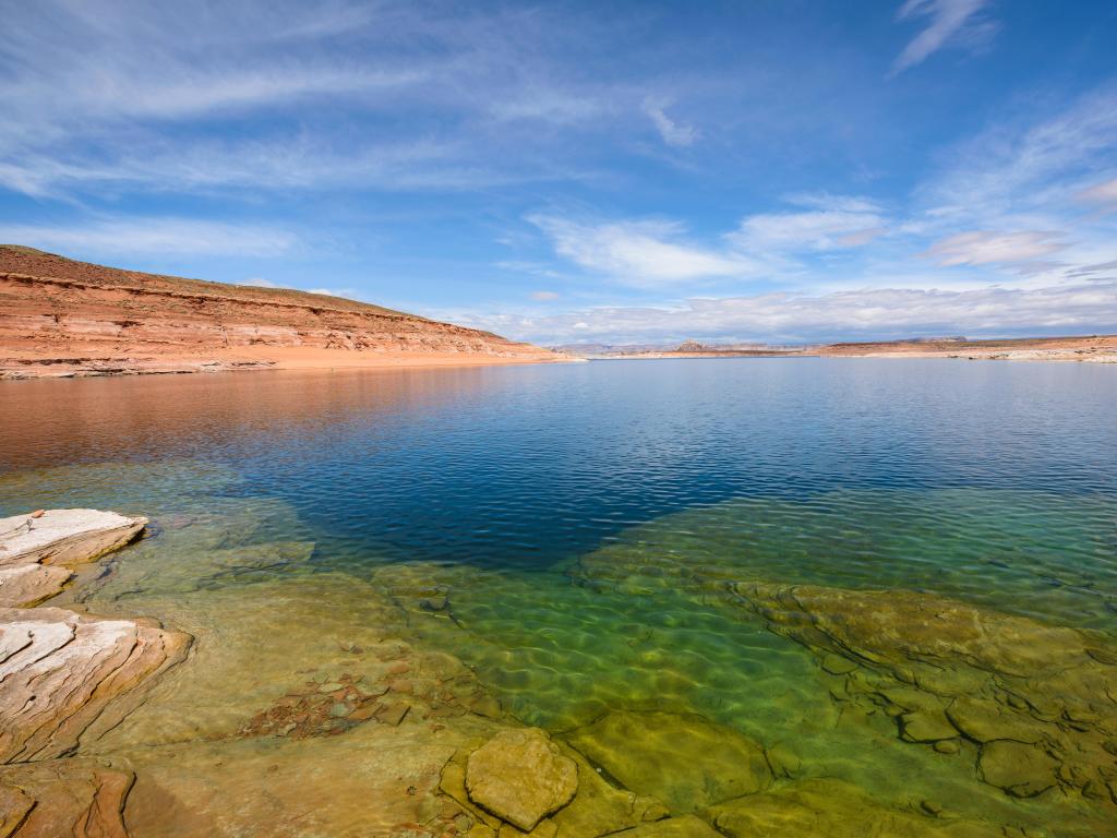 Glen Canyon National Recreation Area, Page, Arizona, USA with colorful sandstone rocks around Lake Powell taken on a sunny day.