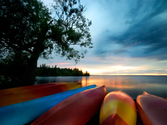 Sunset view of Hecla-Grindstone Provincial Park Hecla-Grindstone Provincial Park, which includes Hecla Island, with bright canoes along the shoreline