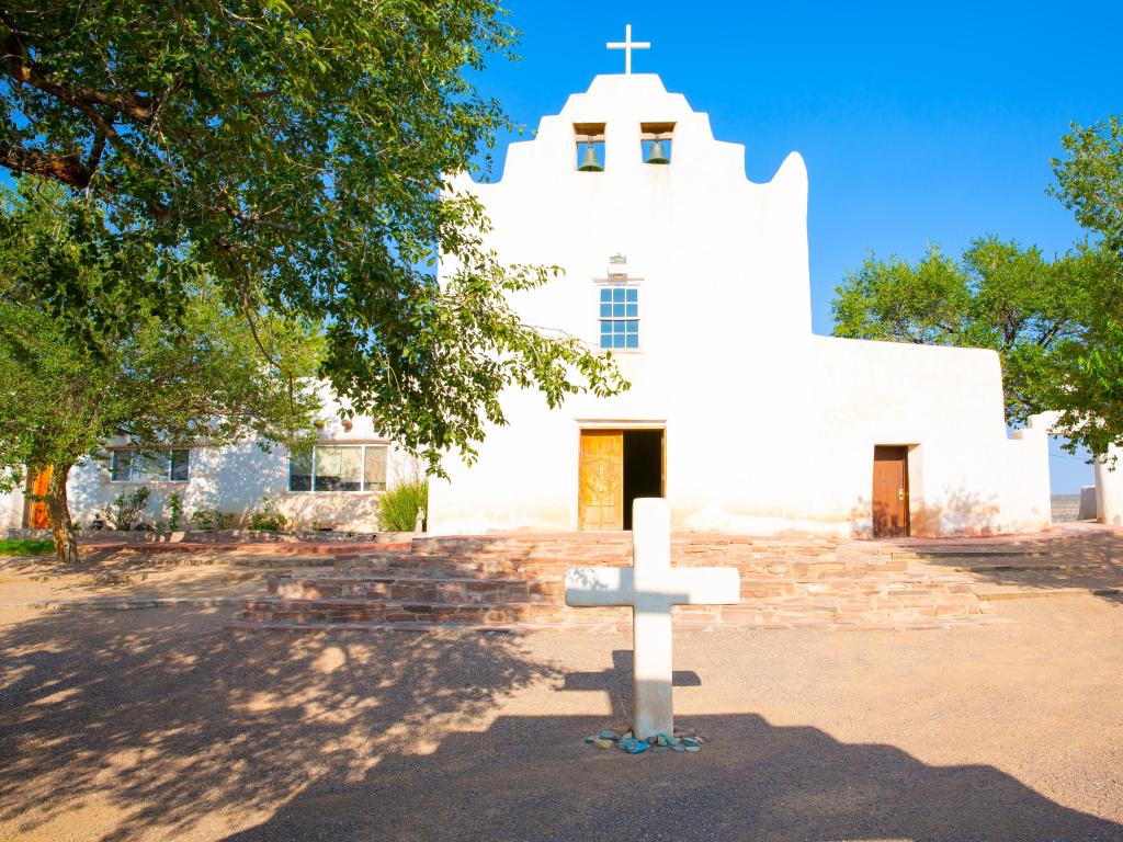 The historic white walled front of St. Joseph Church in Laguna Pueblo indian reservation