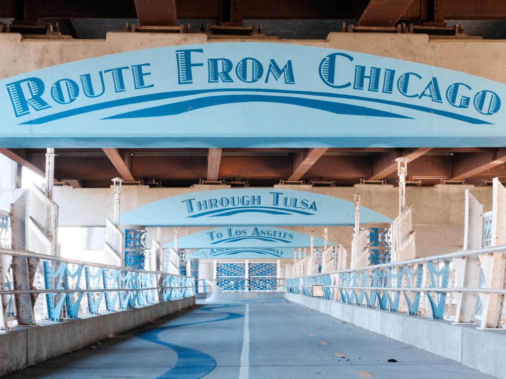 Former Route 66 bridge in Tulsa, Oklahoma. Pale blue iron bridge, now a pedestrian walkway.