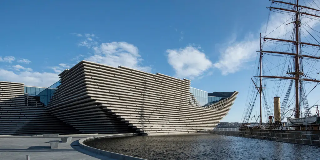 The new V&A Dundee Museum of Design sits on the waterfront alongside the RSS Discovery ship