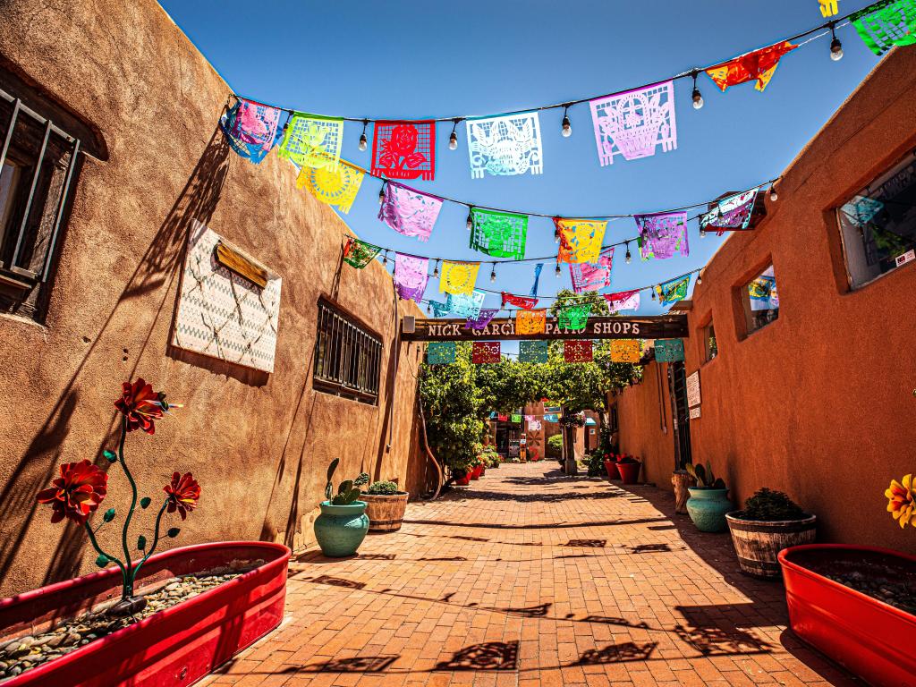 Albuquerque, New Mexico, USA taken on a sunny day with a view of the adobe style buildings in Poco Apoco Plaza in the historic Old Town section of Albuquerque, New Mexico.