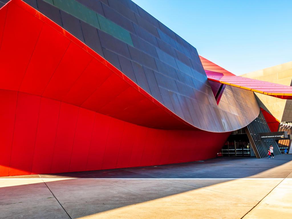 Post-modern red entrance to the museum on a sunny day
