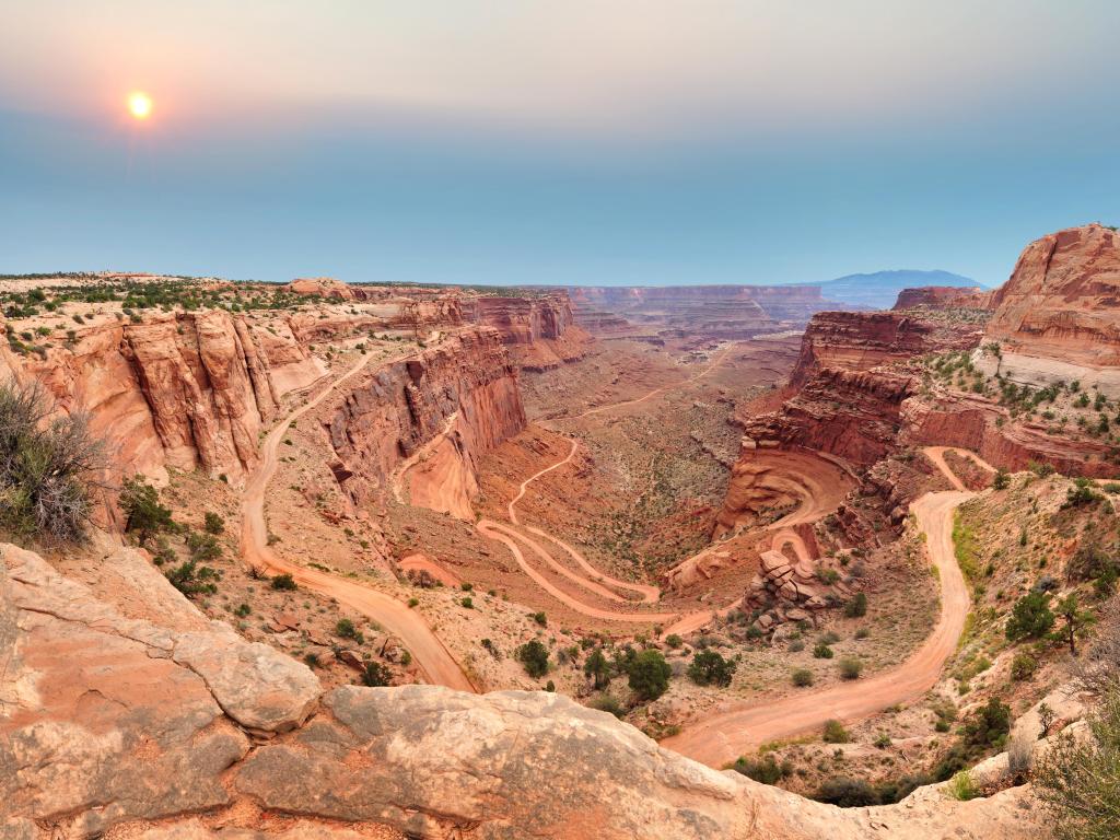 Canyonlands National Park, Utah, USA taken at Shafer Trail Road switchbacks just as the sun is setting and looking down to the valleys below. 