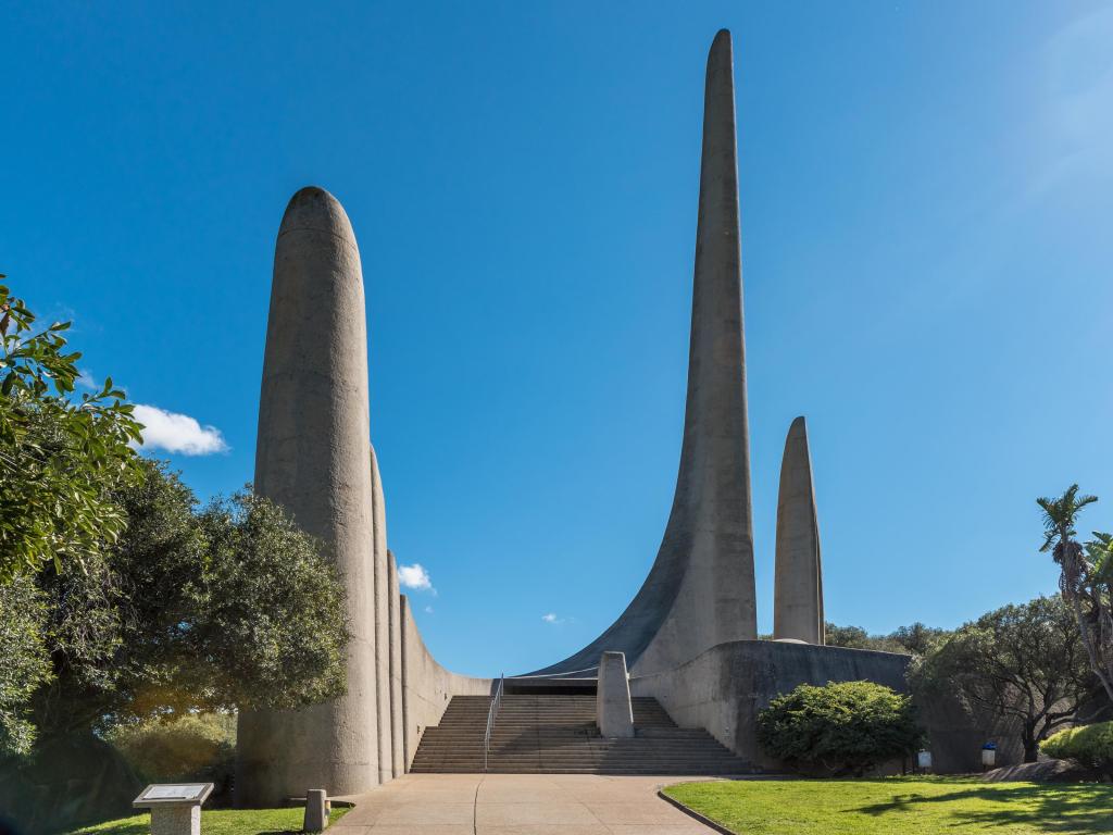 Tall, modern monument in Paarl, photo taken from the ground-level on a sunny day
