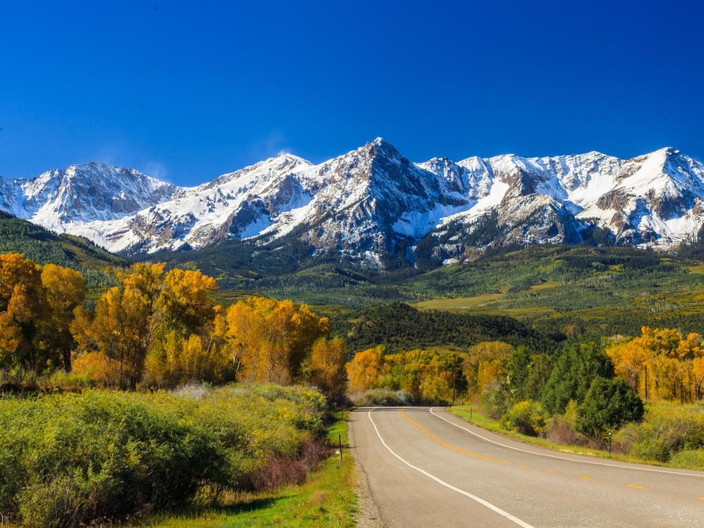 Countryside road, Rocky Mountains, fall season in Colorado