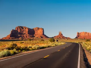 Empty scenic highway in Monument Valley, Arizona, USA