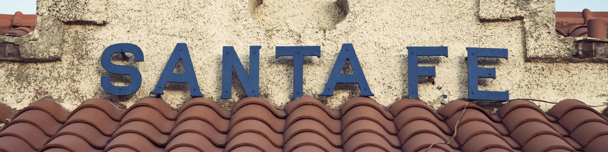 Sign for Santa Fe atop the historic railway station building, located in the city's downtown area