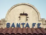 Sign for Santa Fe atop the historic railway station building, located in the city's downtown area