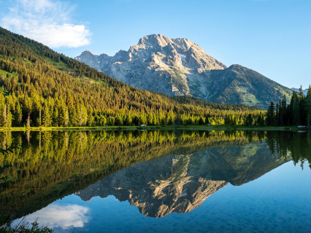 Mirrored view of Mt. Moran on String Lake on a sunny day
