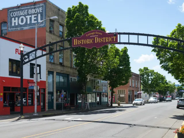 Arched sign OF The Historic District in the small town of Cottage Groove on a sunny day