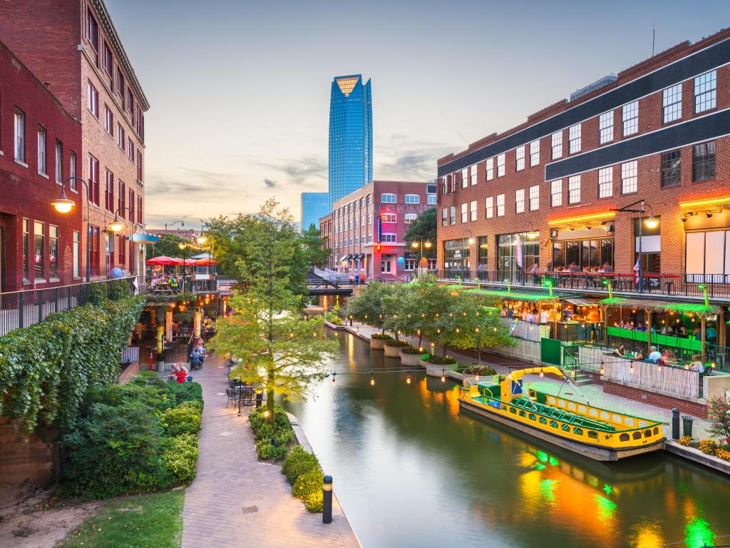 Oklahoma City, Oklahoma, USA cityscape in Bricktown at dusk over the canal 