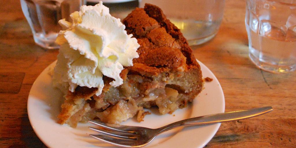 A slice of apple pie and whipped cream at Winkel 43 in Amsterdam 