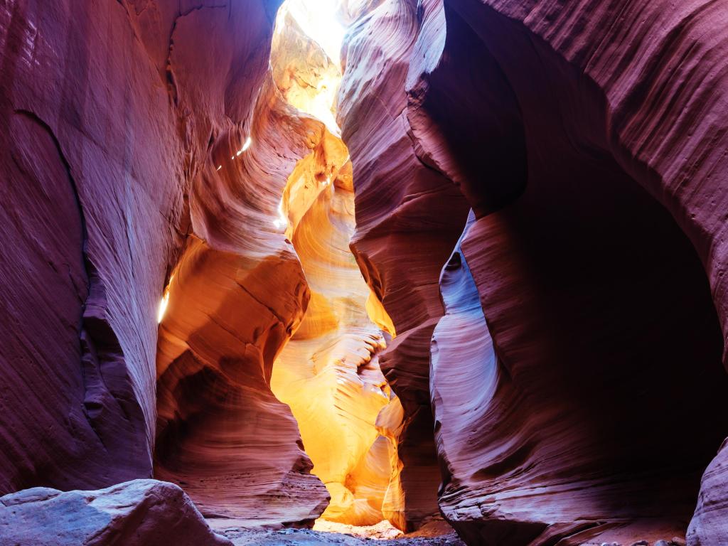 Strange sandstone rock formation with a high canyon in the middle