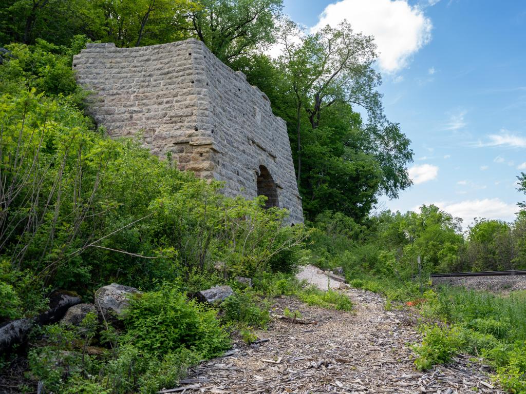 Red Wing, Minnesota, USA with a view of the G.A. Carlson Lime Kiln in the Barn Bluff hiking area on a sunny day.