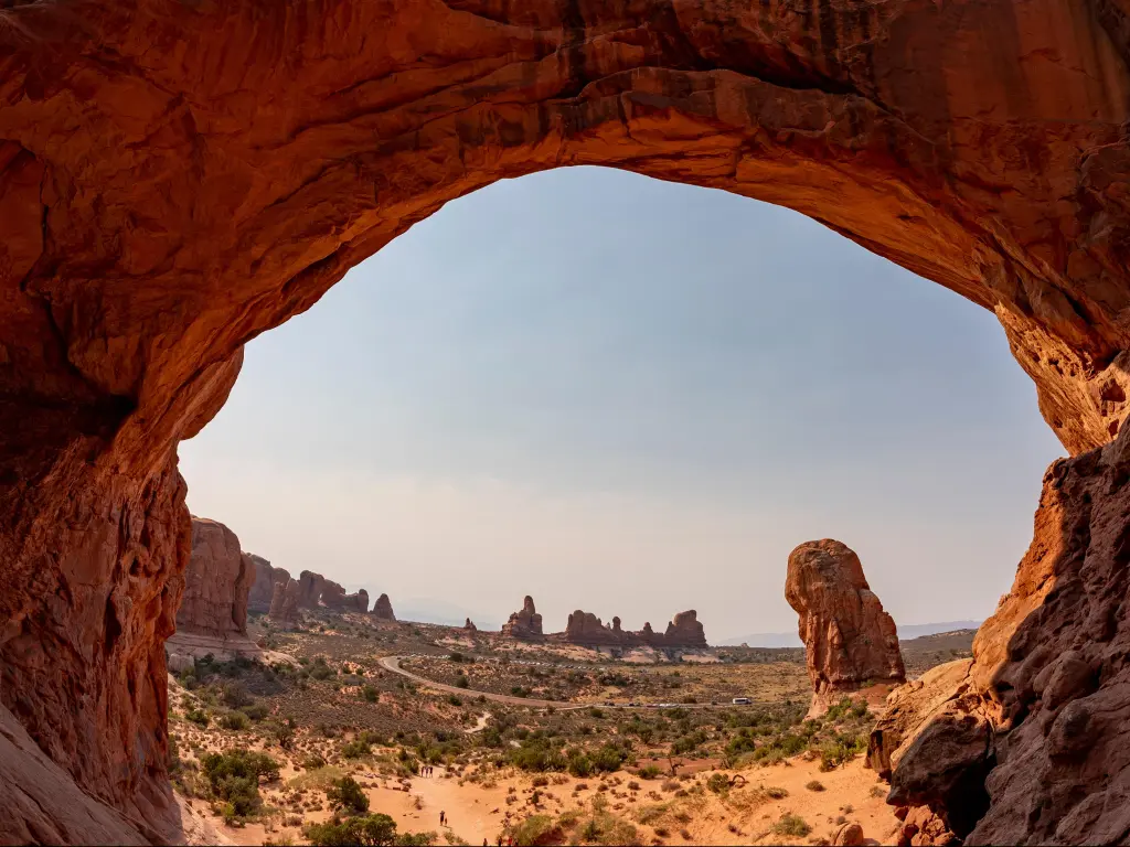 Arches National Park, Utah, USA with a rock desert view from the cave.