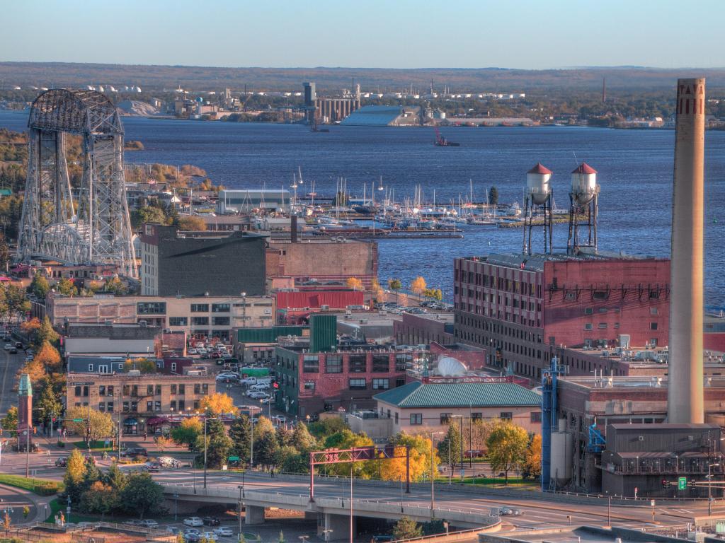 Aerial view of Duluth, Minnesota, showing the red brick buildings at dusk, on the shores of Lake Superior