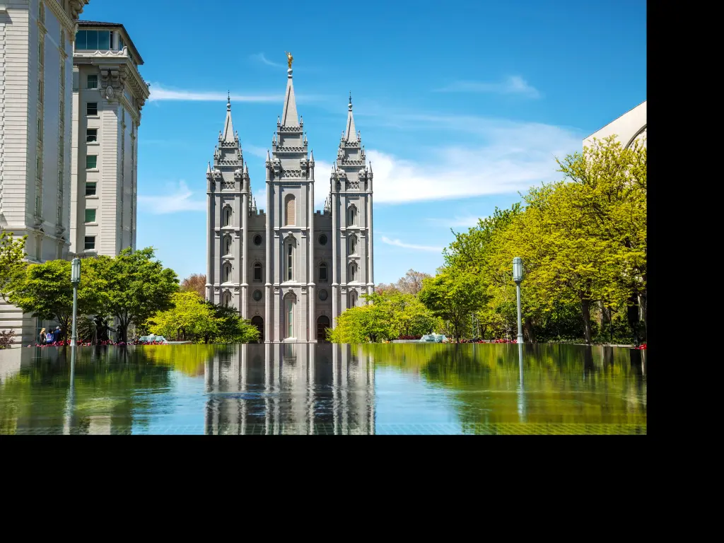 View of  the Salt Lake Mormon Temple from behind the Reflecting Pool in Salt Lake City, Utah