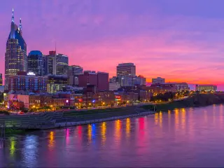 Nashville, Tennessee, USA skyline taken at early evening with pink skies.